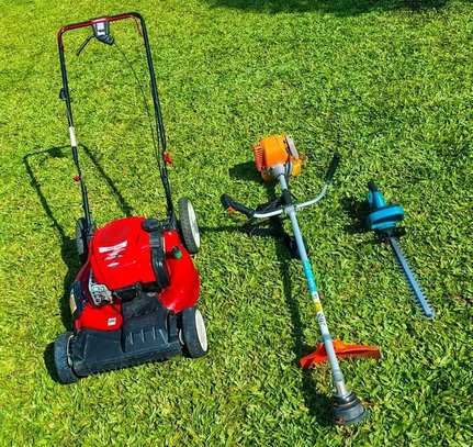 The Kellyscappers Central crew's mower, brush cutter and trimming tools ready for work